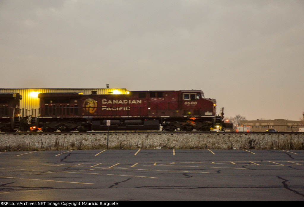 CP AC44CW Locomotive leading a train